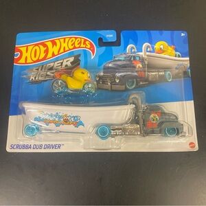 Blue and Yellow Toy Transport and Race Car Set